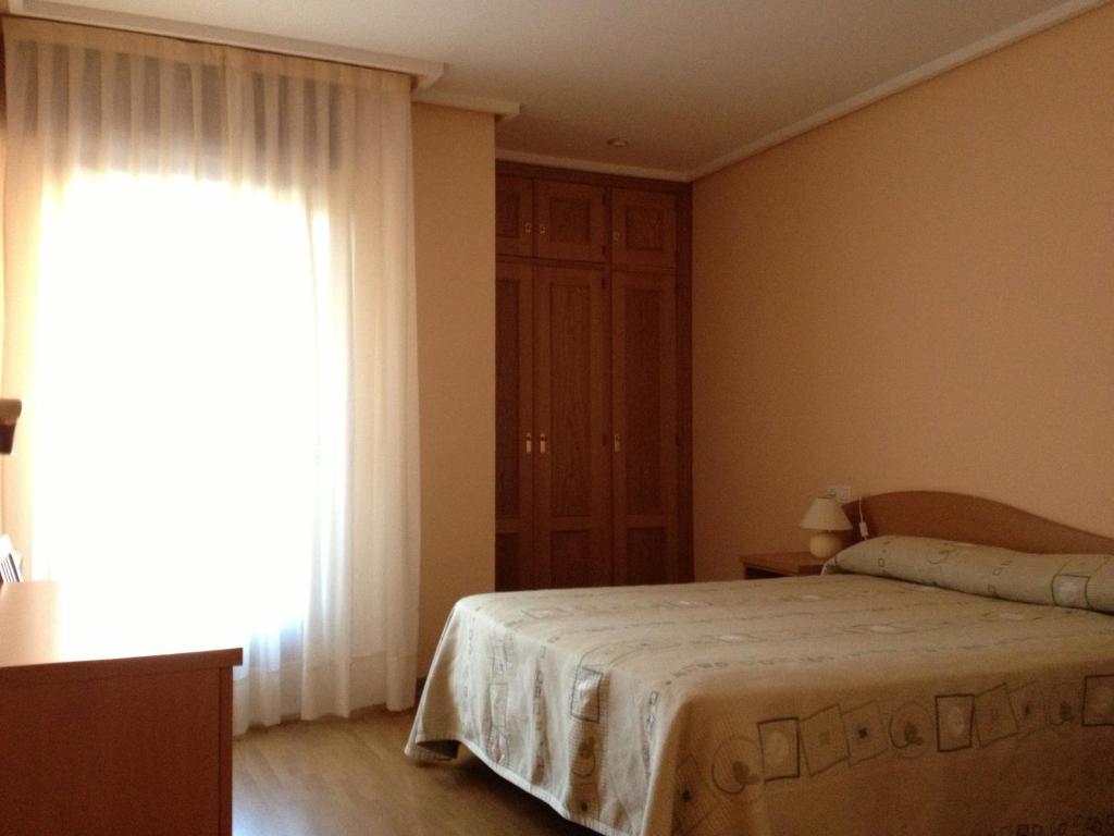 Apartamentos Turisticos Puerta de León Habitación foto