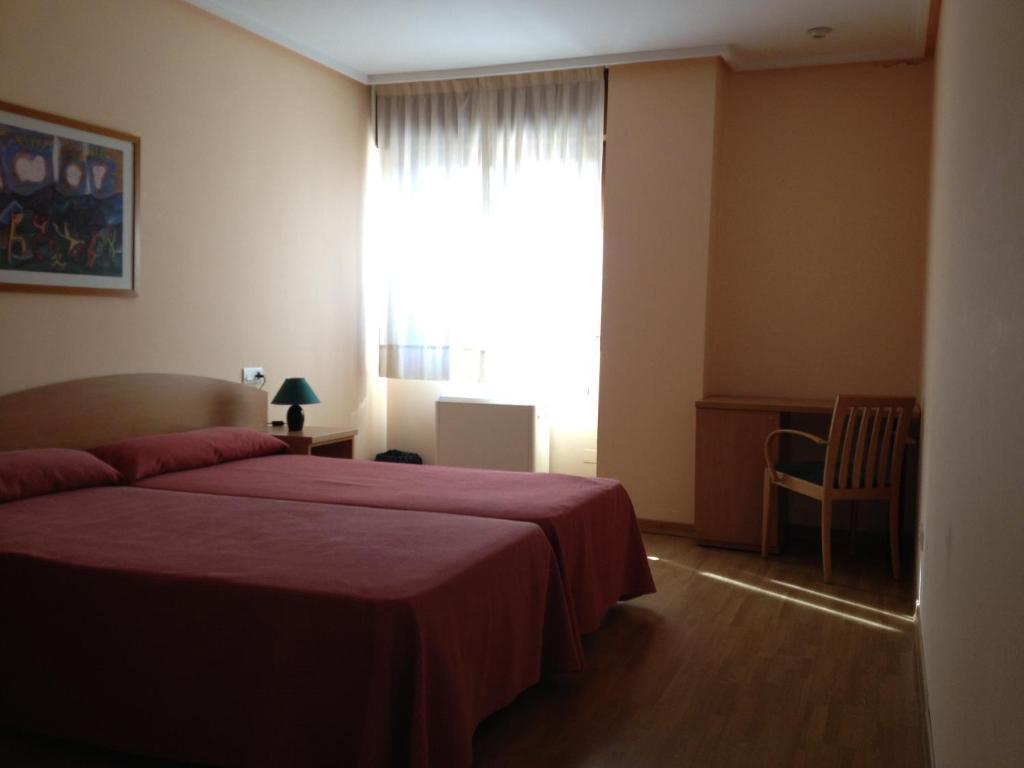 Apartamentos Turisticos Puerta de León Habitación foto